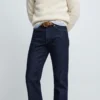 Model Wearing Men's Dark Indigo Bootcut Jeans with Camel Chelsea Boots - Old Money Style