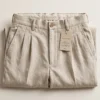 pleated linen trousers men beige flatlay front view
