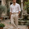 pleated linen trousers men beige styled with white shirt old money look